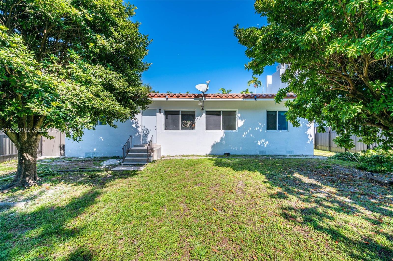 330 Southwest 27th Road Miami, FL 33129 - Photo 47 of 62 a view of a house with a yard