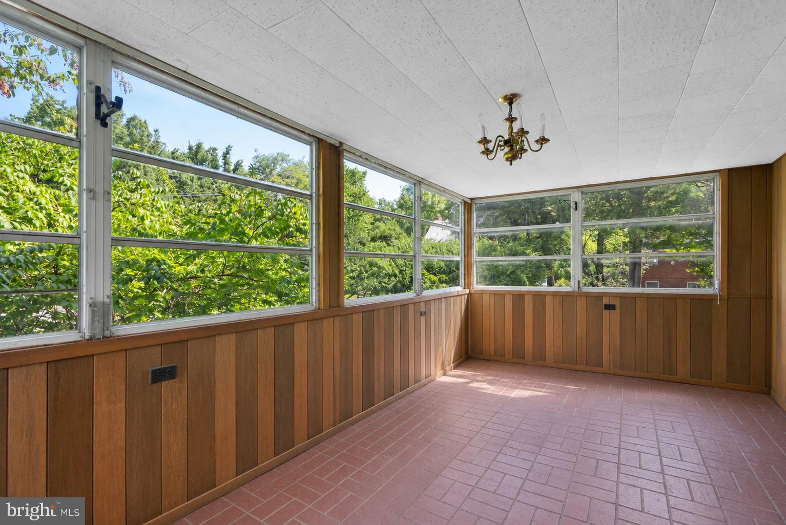 8911 Bradford Road Silver Spring, MD 20901 - Photo 42 of 55 Upper level sunroom virtual
