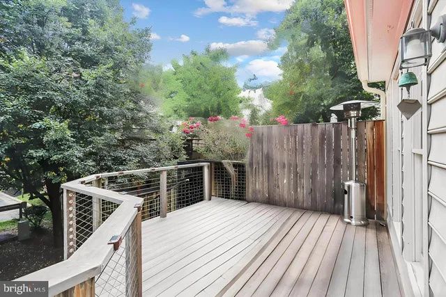 a view of balcony with furniture