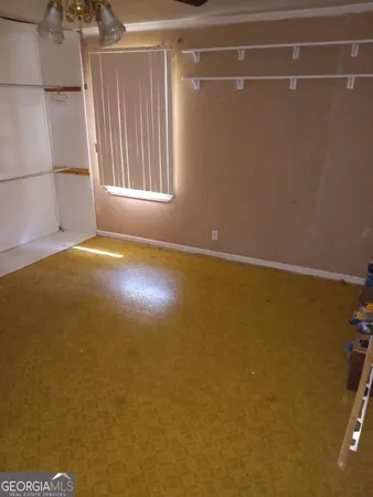 a empty room with a window