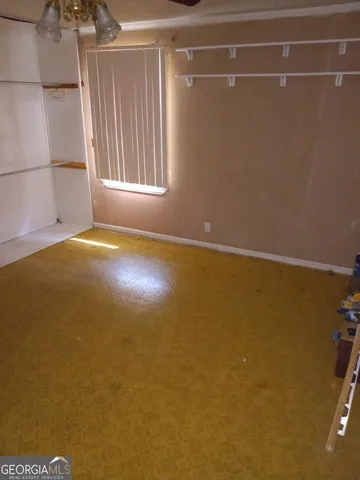 a empty room with a window