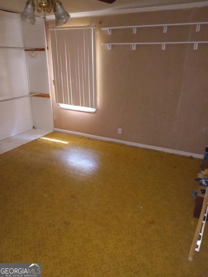 139 Moore Street Willacoochee, GA 31650 - Photo 15 of 33 a view of an empty room with a window