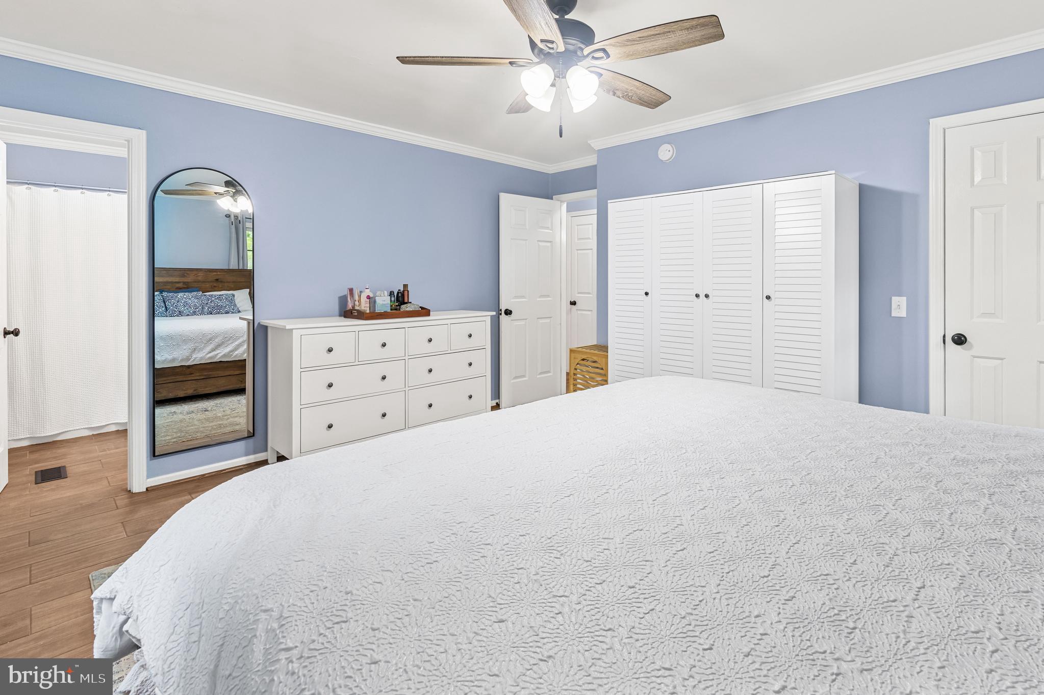 1425 Jacks Shop Road Rochelle, VA 22738 - Photo 24 of 56 a bedroom with a bed and a dresser