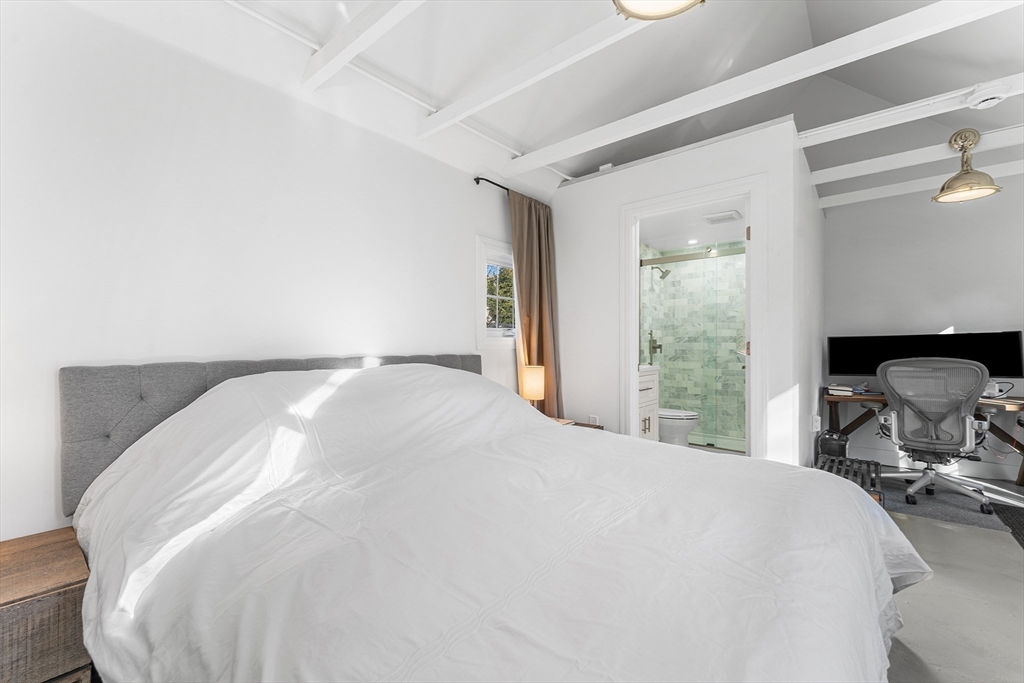 29 Cottage Street Wellesley, MA 02482 - Photo 34 of 42 a large white bed in a white room