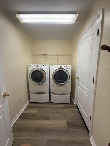 a utility room with dryer and washer