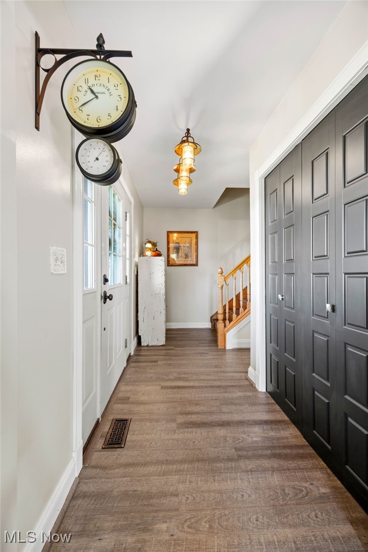 11827 Stratton Road West Salem, OH 44287 - Photo 16 of 47 Entryway with wood finished floors and stairs
