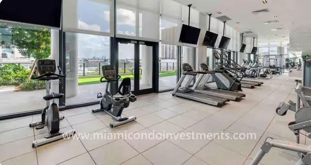 a swimming pool with outdoor seating and yard