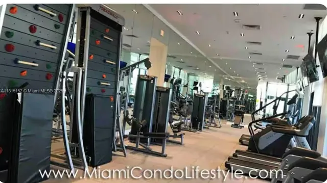 a view of staircase with a rug