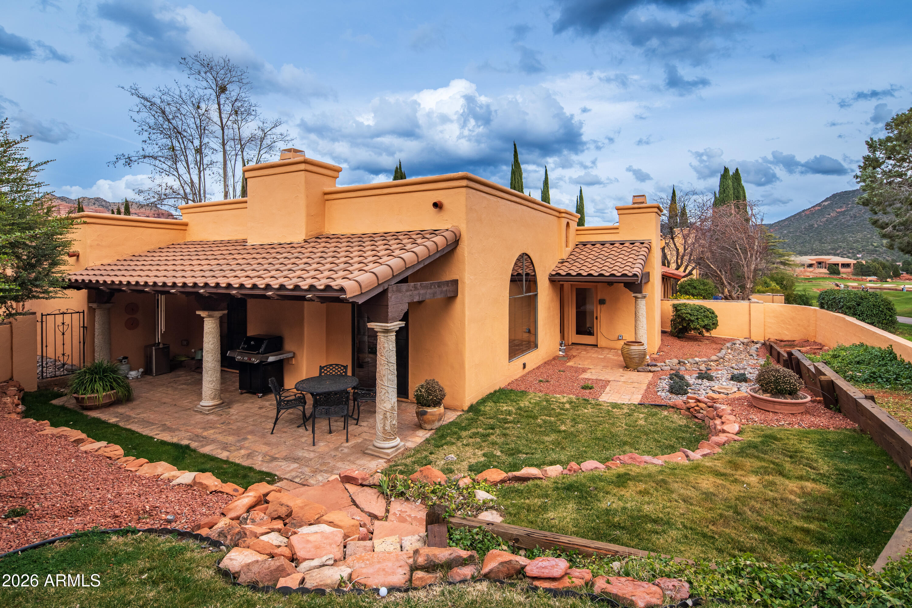167 Ridge Trail Drive, Unit 32 Sedona, AZ 86351 - Photo 35 of 43 SIDE AND BACK YARD ON GREENS