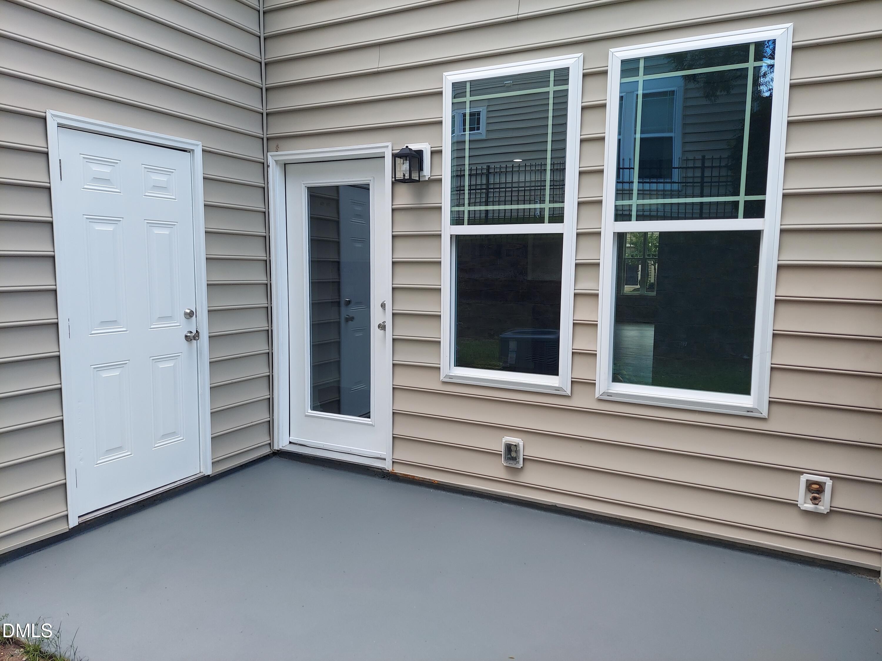408 Timpson Avenue Durham, NC 27703 - Photo 11 of 14 a view of a house with a large window