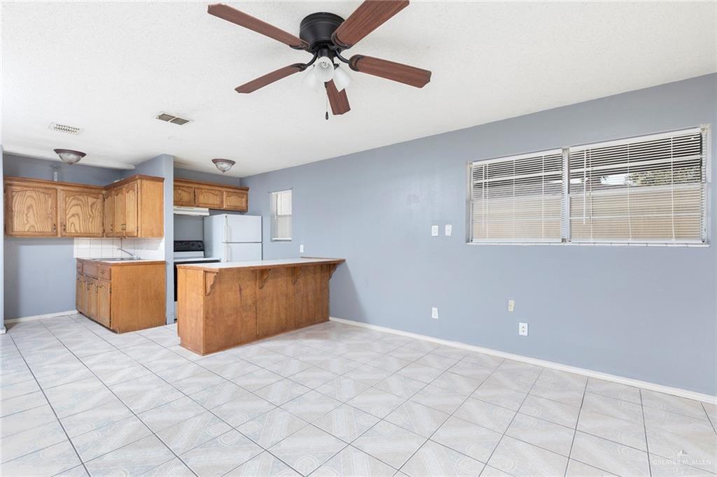 3417 North Kenyon Road Edinburg, TX 78542 - Photo 4 of 12 a view of kitchen with window