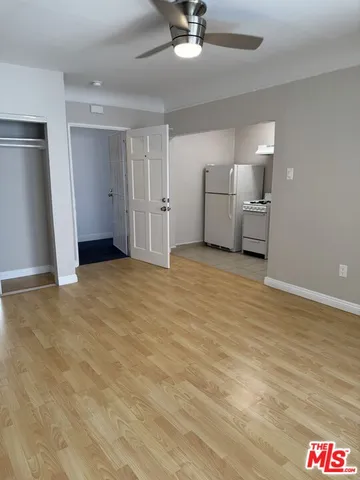 a view of a livingroom with a furniture