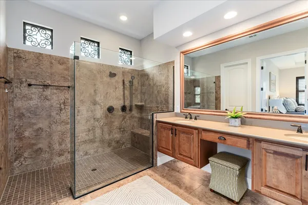 a bathroom with a sink and a shower
