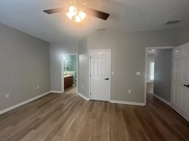 a bathroom with a sink a toilet and tub