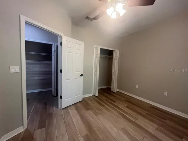 a view of a livingroom with wooden floor