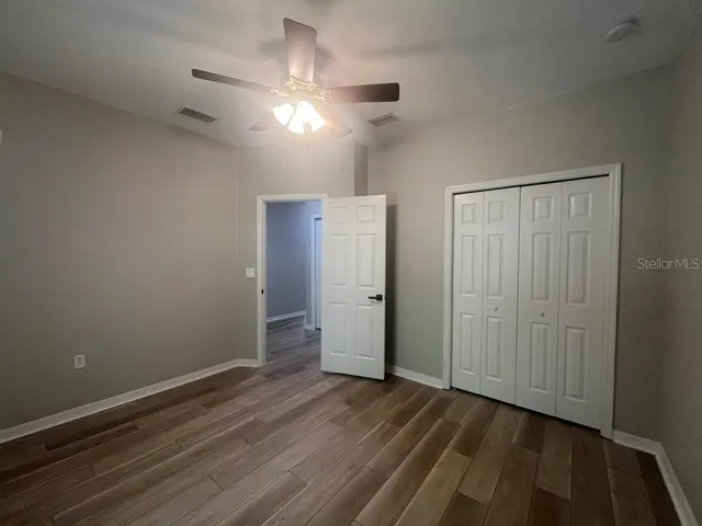 a view of a house with a small yard