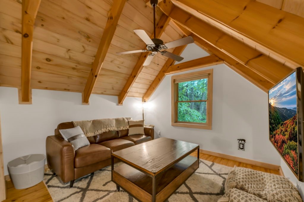 192 Dewitt Barnett Road Vilas, NC 28692 - Photo 23 of 32 a living room with furniture a couch and a window