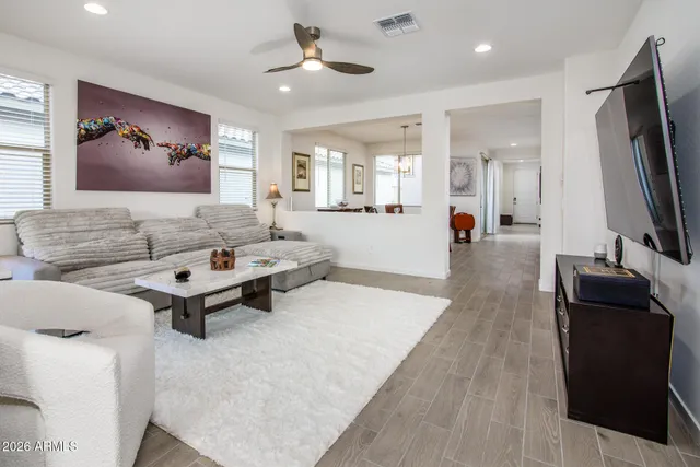 a bedroom with a bed and a television in it