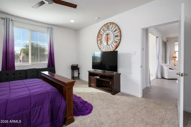 a kitchen with kitchen island a sink appliances and cabinets