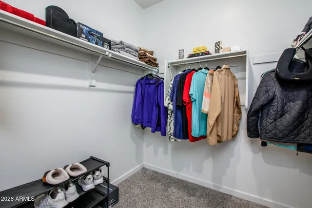 a view of a patio with a table and chairs