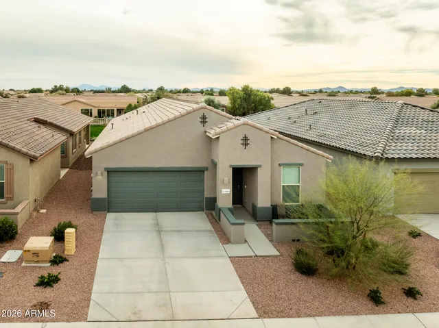 a terrace with outdoor seating and city view