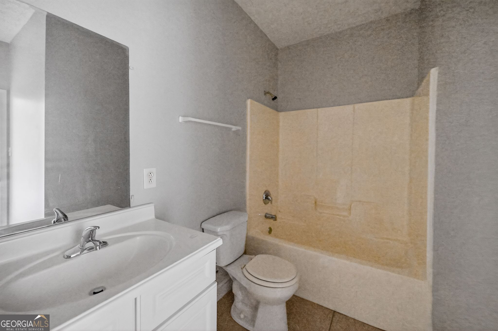 607 Lane Street Griffin, GA 30223 - Photo 27 of 31 a bathroom with a sink toilet and shower