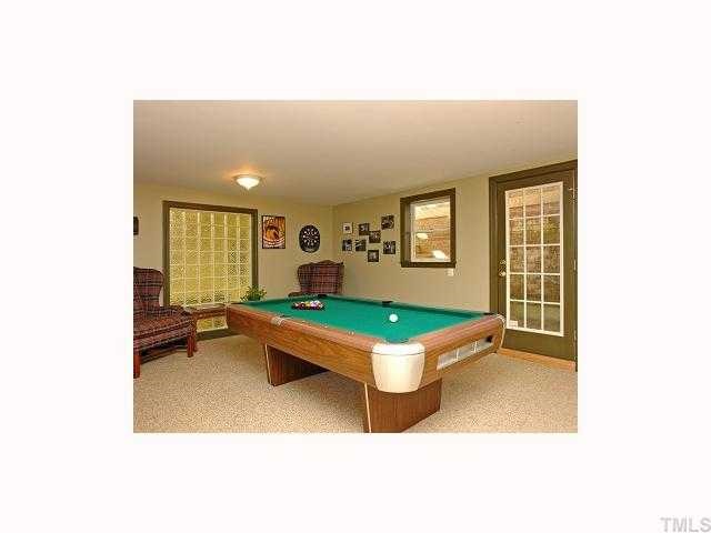 2117 St Marys Street Raleigh, NC 27608 - Photo 9 of 12 a room with pool table and a window