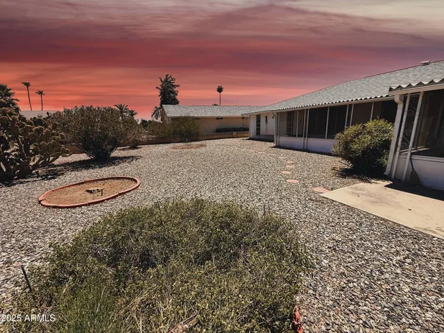 a view of swimming pool with lounge chair