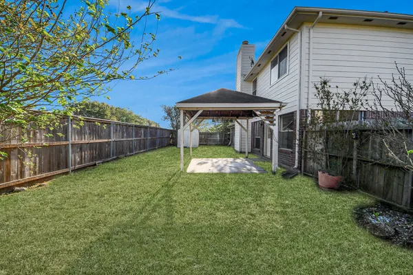 a view of a garden with a slide