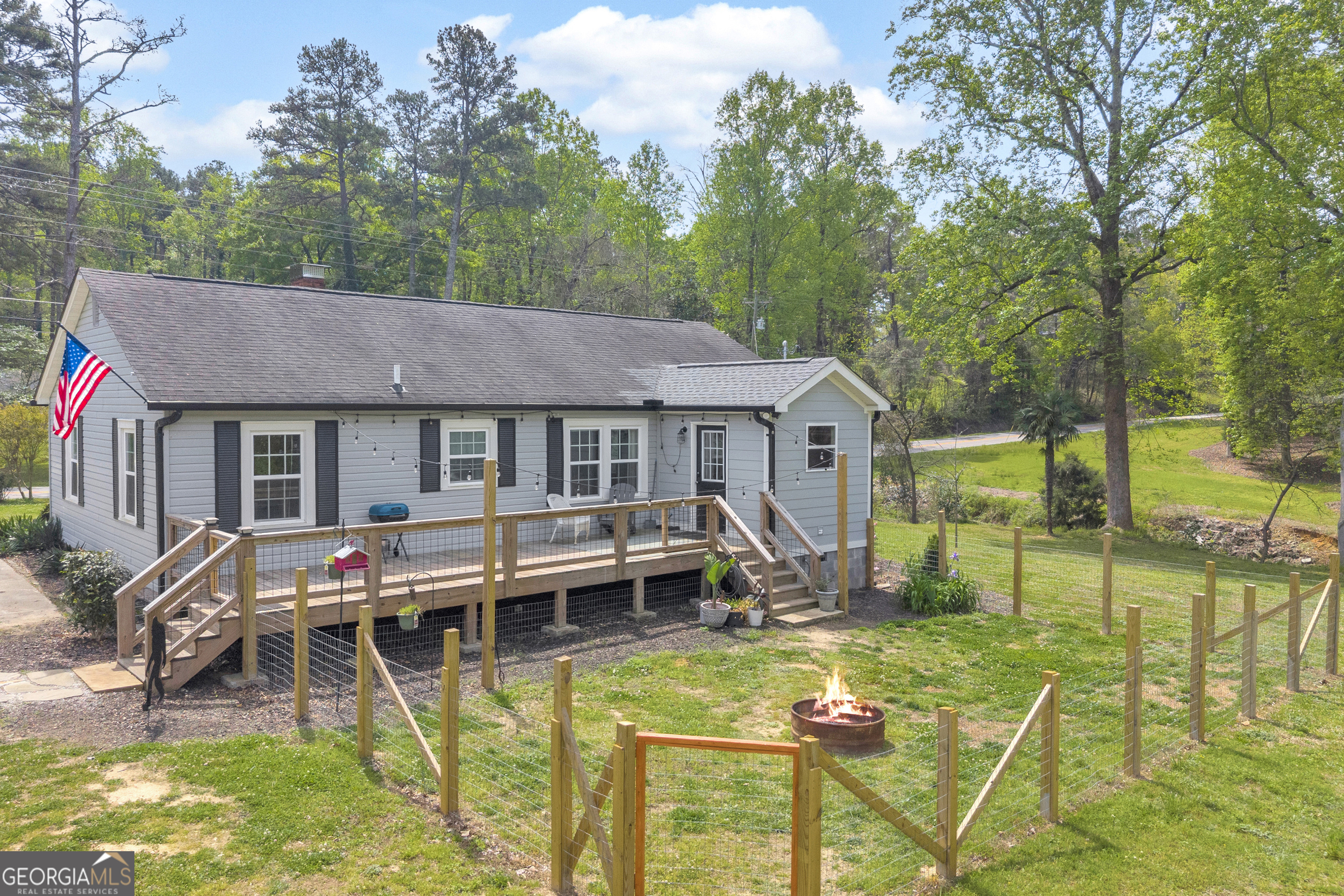 261 Oak Valley Road Toccoa, GA 30577 - Photo 36 of 52 a aerial view of a house with swimming pool and sitting area