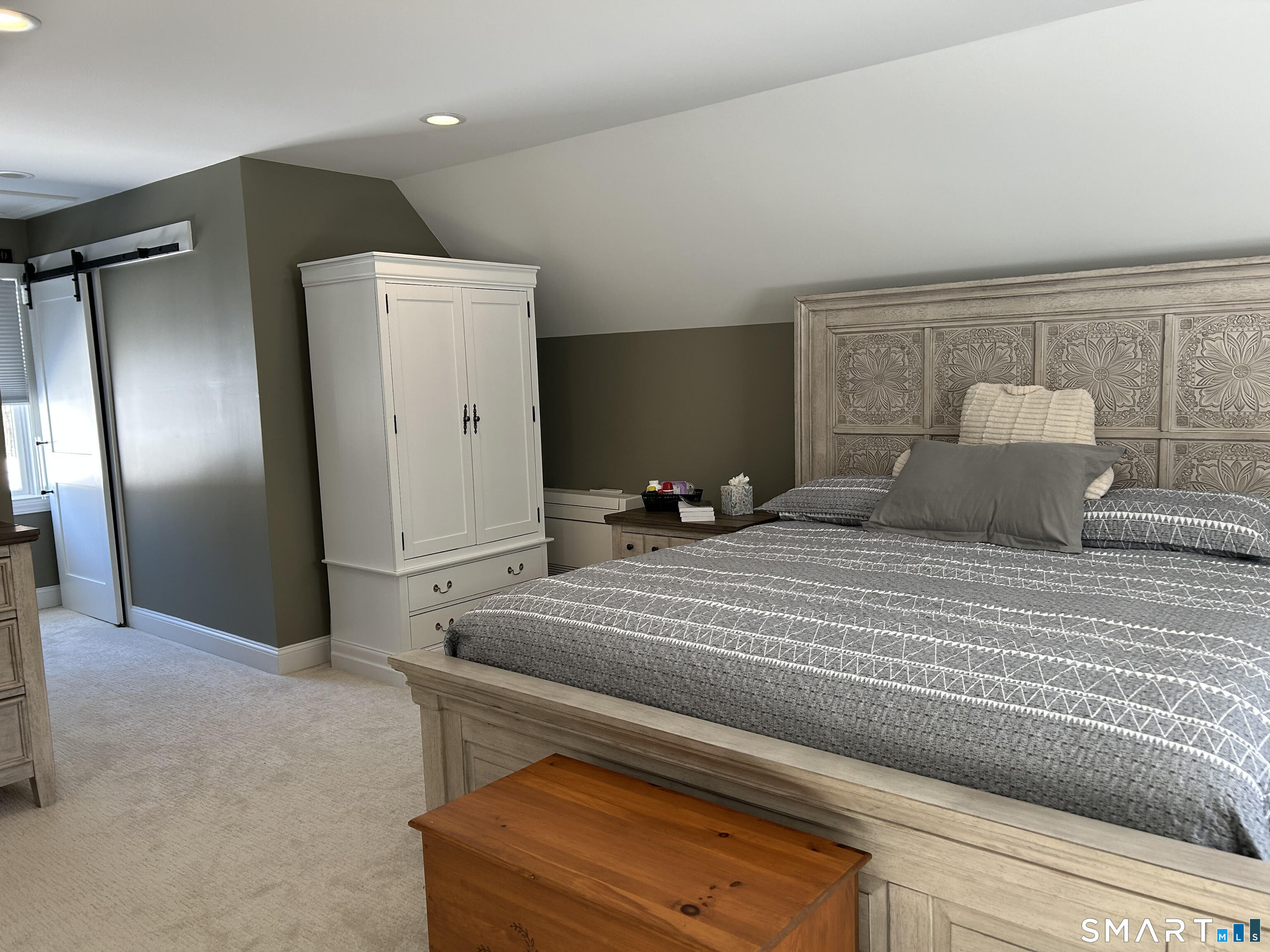 151 Bushy Hill Road Deep River, CT 06417 - Photo 21 of 32 a bedroom with a bed and mirror