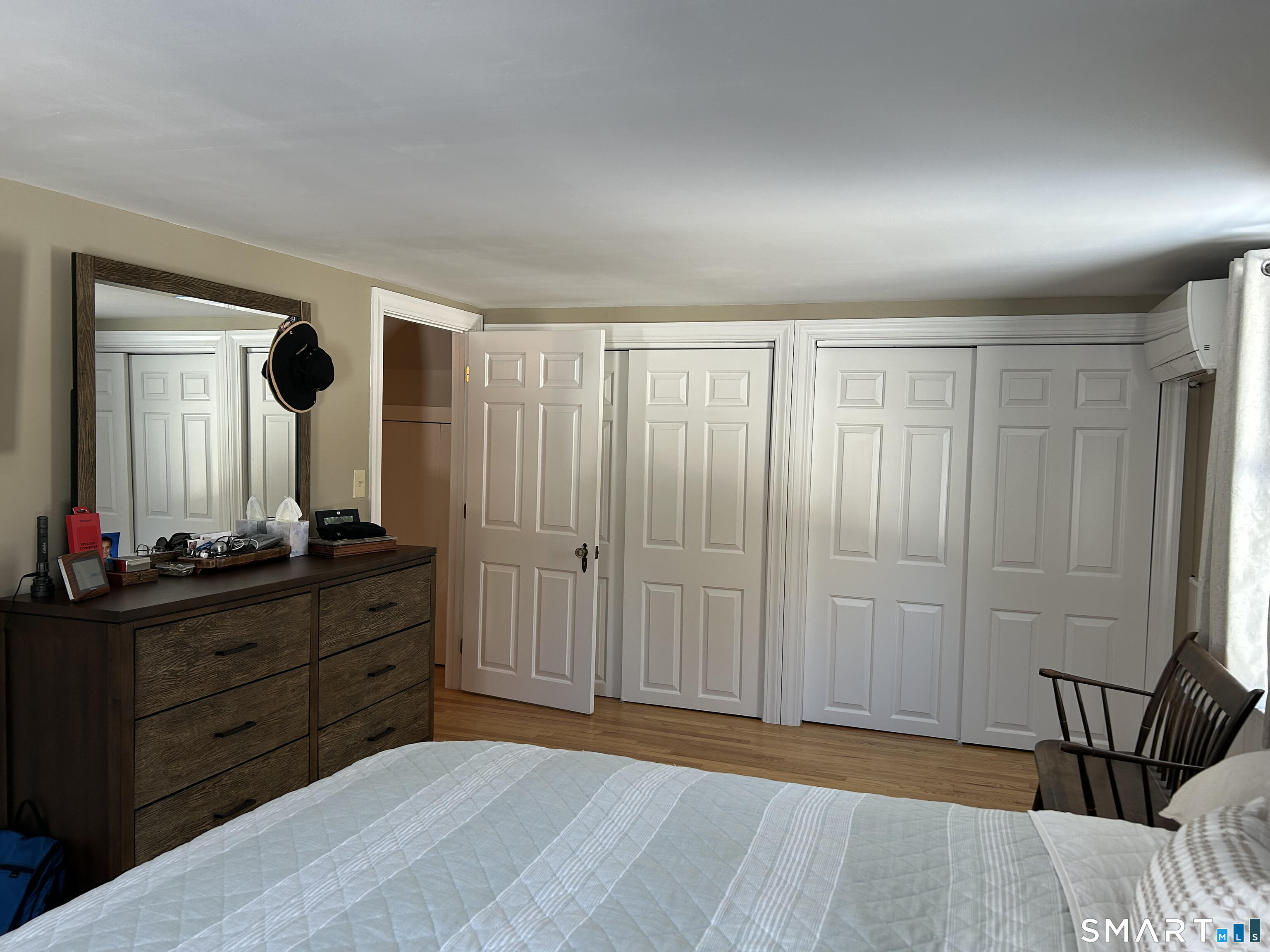151 Bushy Hill Road Deep River, CT 06417 - Photo 24 of 32 a bedroom with a dresser and a mirror