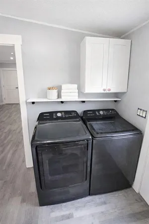 a kitchen with a stove and a microwave