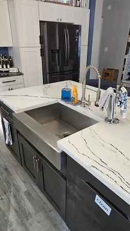 a view of kitchen sink and stove