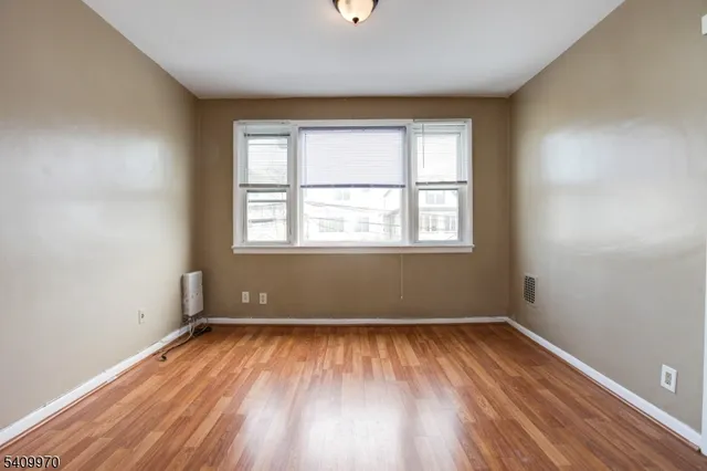 $599,000 | 55 Garretson Avenue, Bayonne, NJ 07002