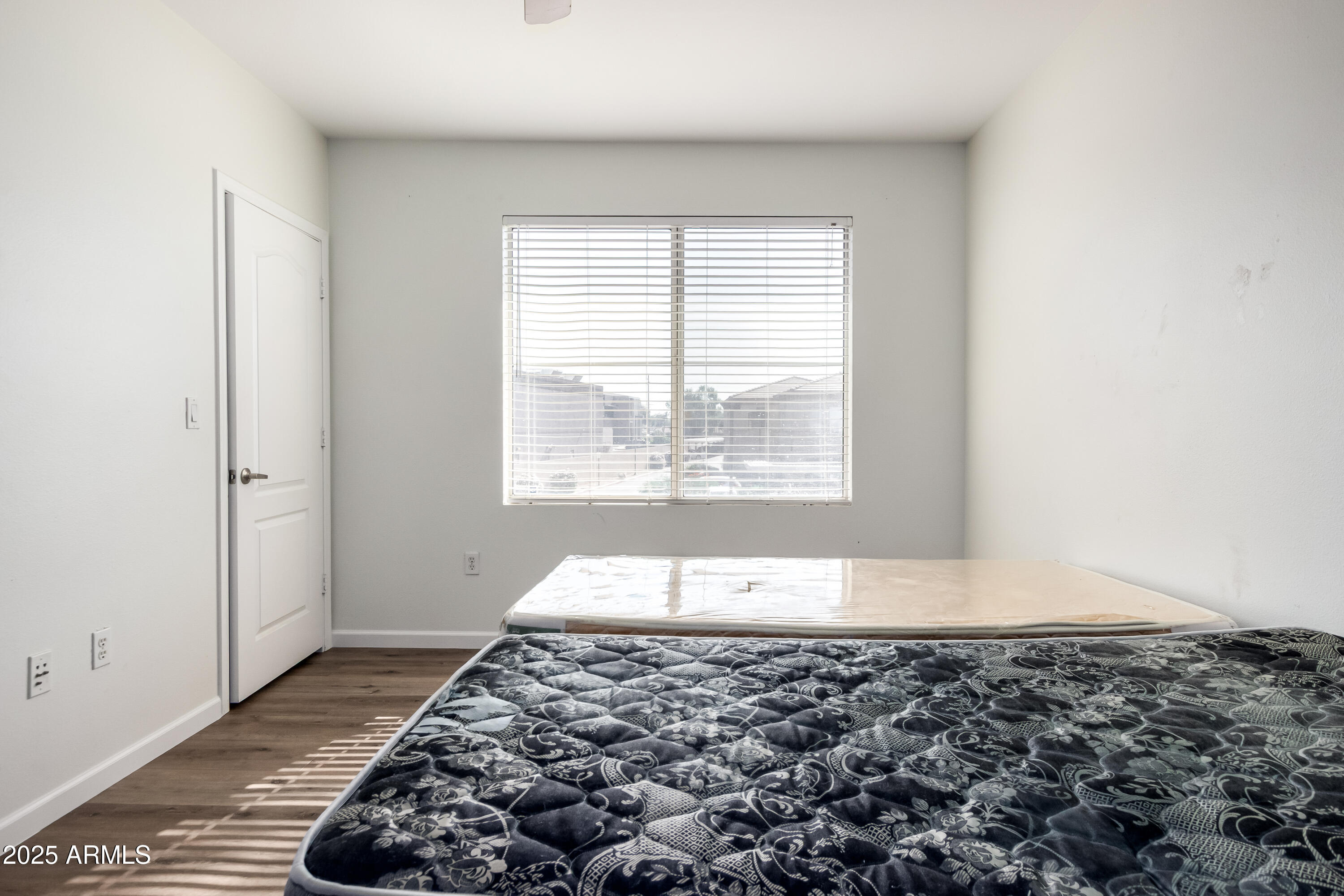 2134 East Broadway Road, Unit 2054 Tempe, AZ 85282 - Photo 9 of 17 a large room with bed