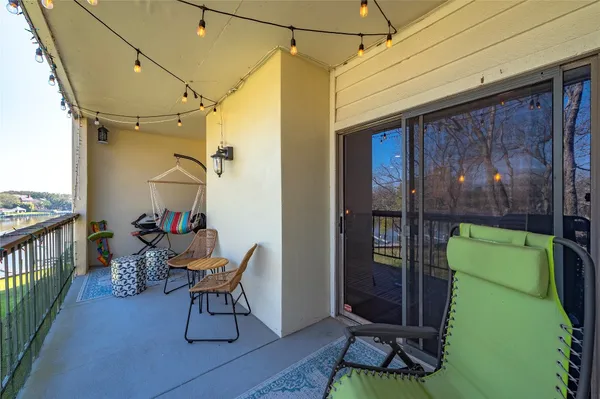 a view of a porch with furniture
