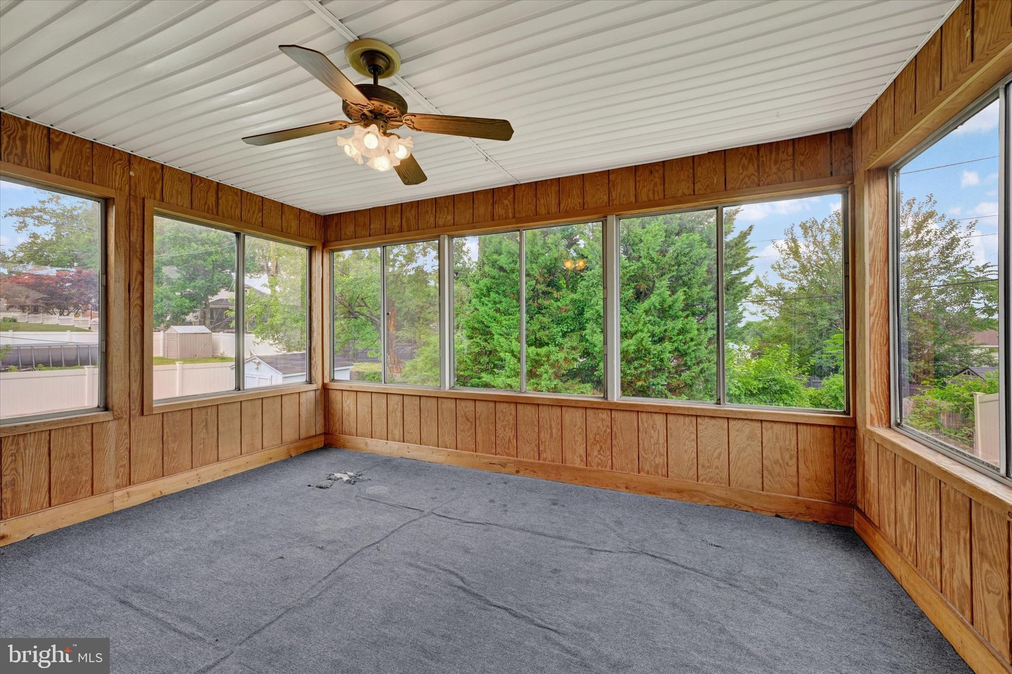 306 Regency Circle Linthicum Heights, MD 21090 - Photo 13 of 73 Relax in the spacious three-season room.