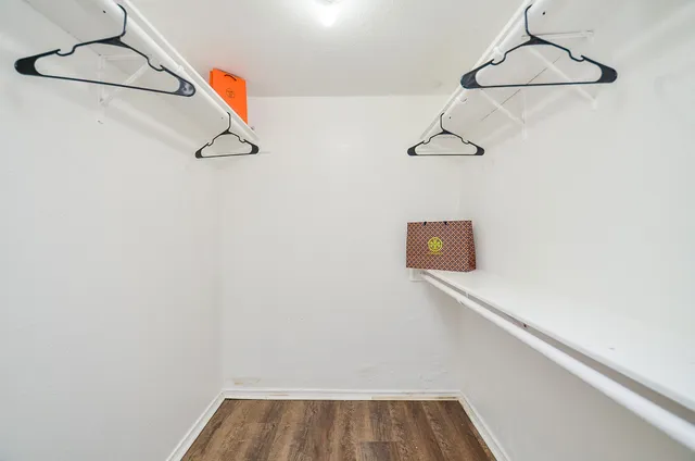 a view of a room with racks on the wall