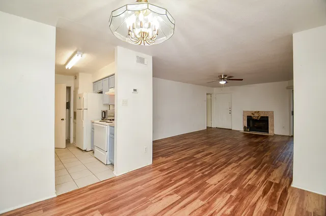 a view of a livingroom with wooden floor