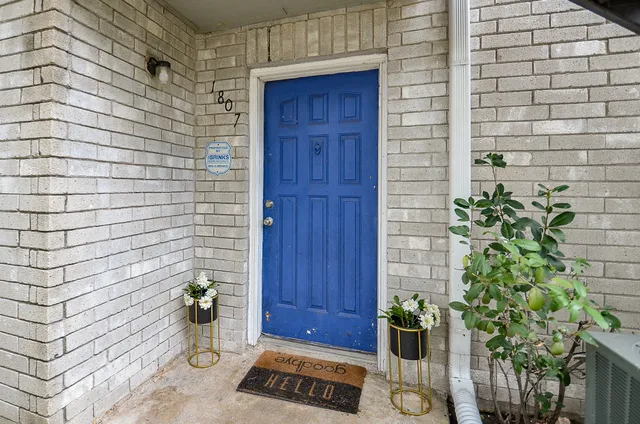 a view of a entryway door front of house