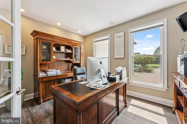 a view of a living room and dining room