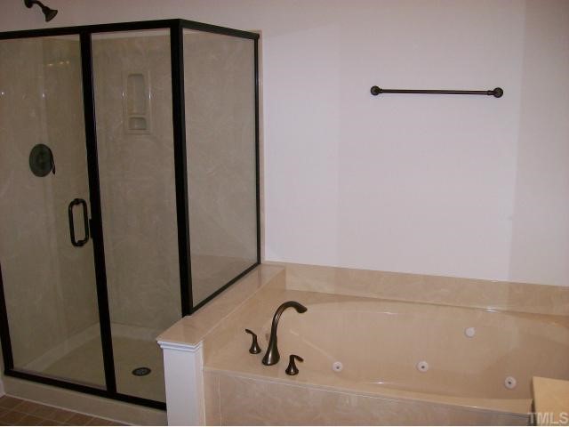 909 Lakeview Road Durham, NC 27712 - Photo 6 of 12 Master bath complete with separate shower and whirlpool tub