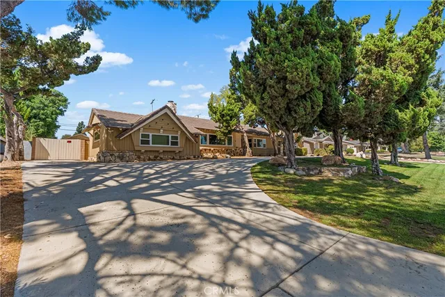 a view of house with outdoor space