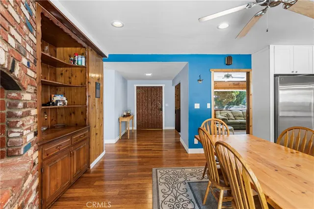 a view of a kitchen with furniture and staircase