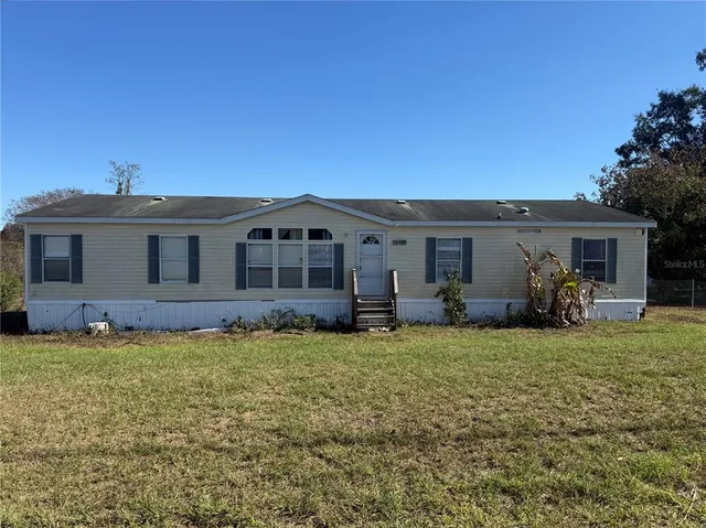 a view of a house with a patio
