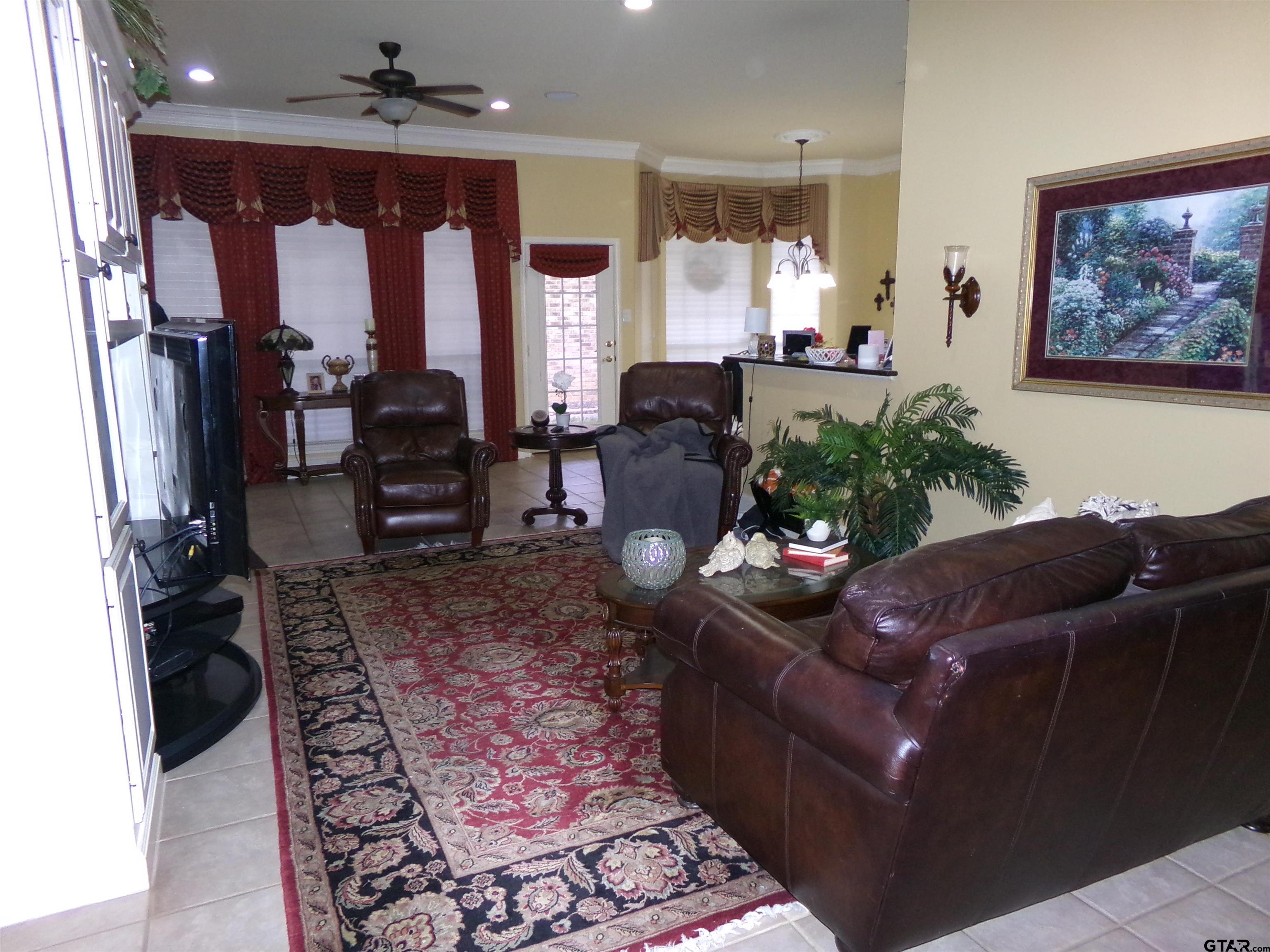 2425 Dietz Lane Tyler, TX 75701 - Photo 4 of 18 a living room with furniture and a fireplace