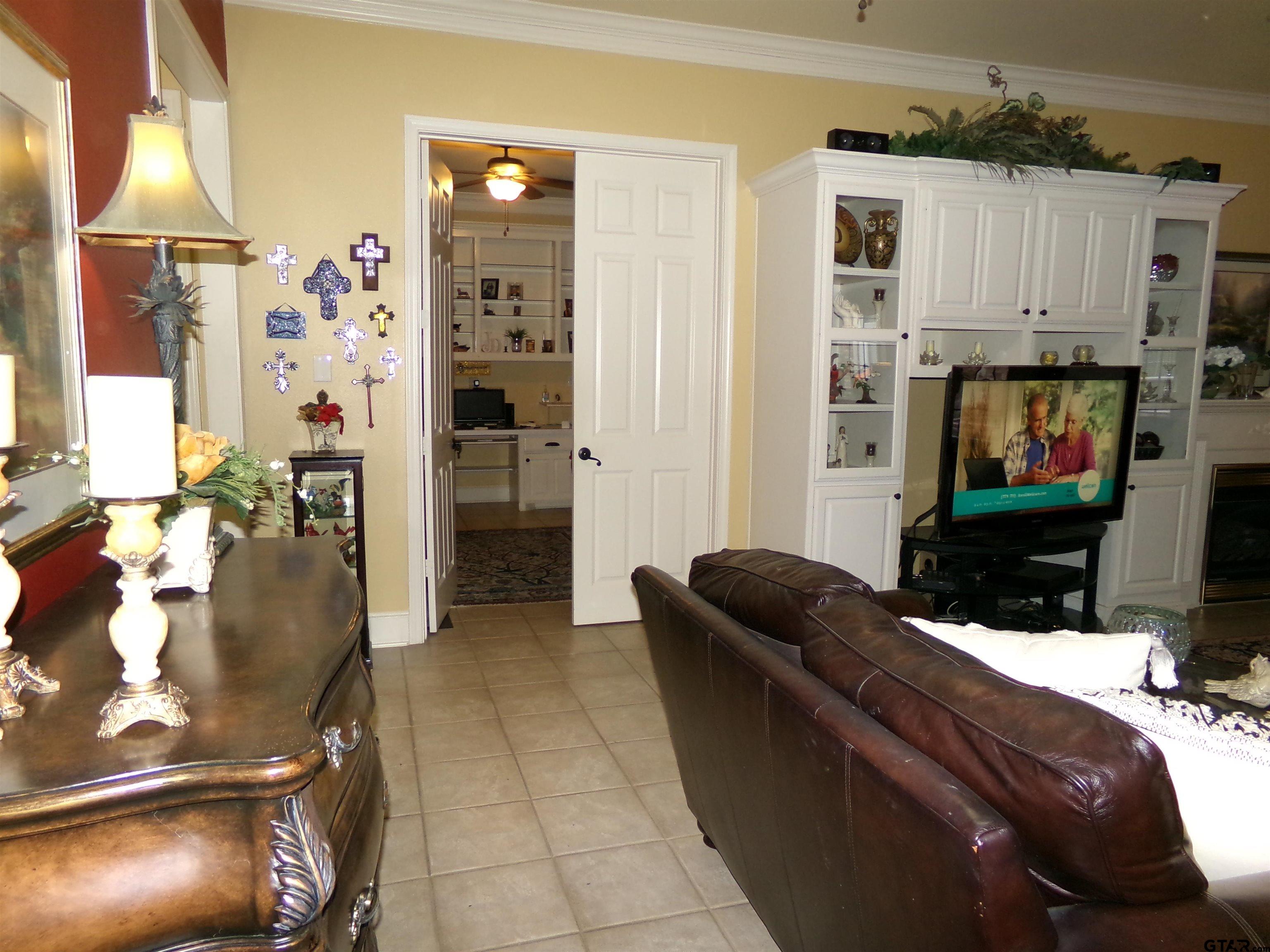 2425 Dietz Lane Tyler, TX 75701 - Photo 6 of 18 a living room with furniture and a flat screen tv