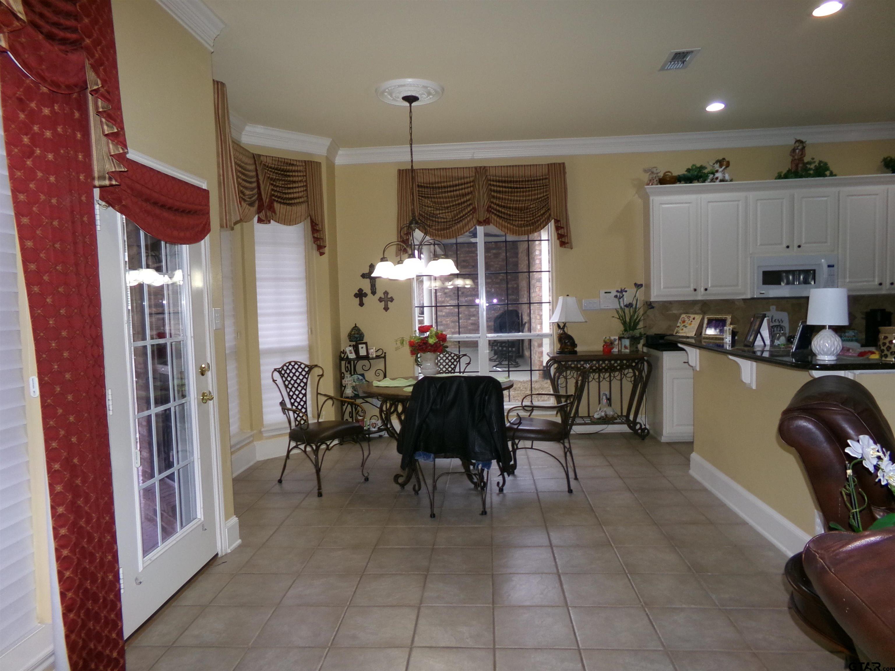 2425 Dietz Lane Tyler, TX 75701 - Photo 10 of 18 a living room with lots of furniture and a large window