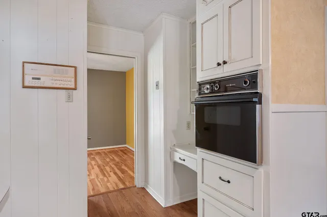 a view of kitchen and microwave